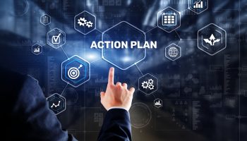 Person activating a digital interface with icons for strategy, planning, and performance tracking